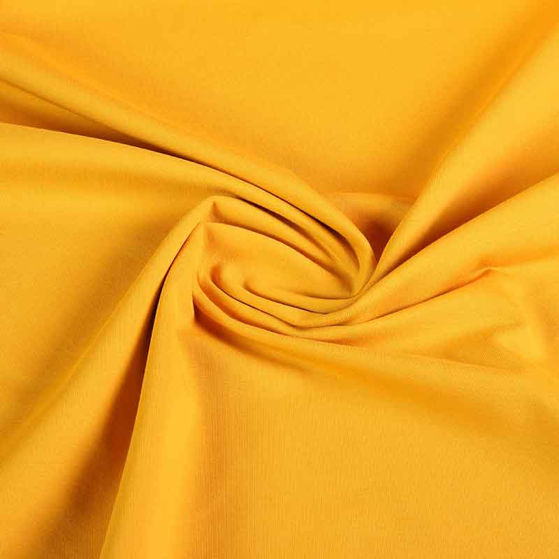 Tricot fabric ochre yellow