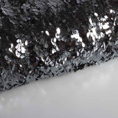Mesh fabric with silver drops