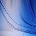 Stretch 4 way dans- en badpakstof ombre blauw/wit