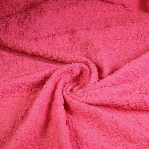 Tricot broderie fabric fuchsia
