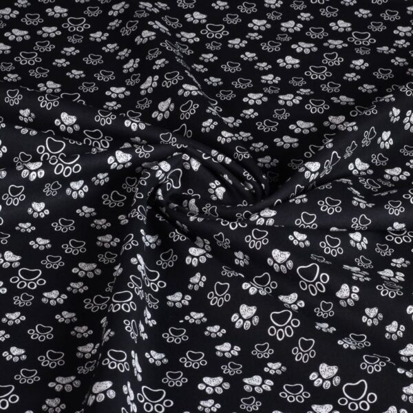 Poplin fabric dog paws black white
