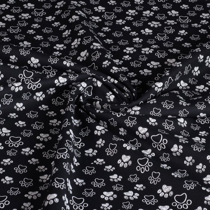 Poplin fabric dog paws black white